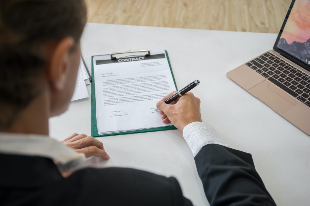 Businessman is signing a partnership contract, Business connection concept.